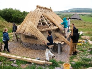 Thatched composting toilet building