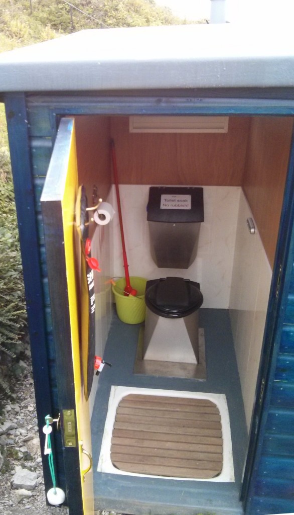 A beach hut toilet and shower cubicle