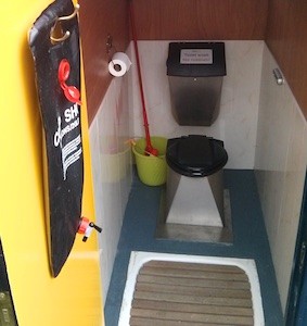 A beach hut toilet and shower cubicle