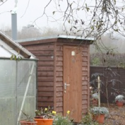 Wooden building for natsol compost toilet